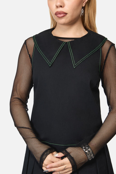 Ärmlös klänning med bygelkrage