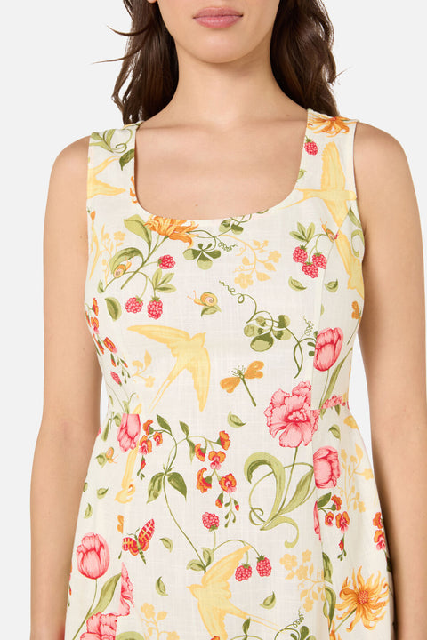 Nyckfull trädgårdsklänning i midimodell