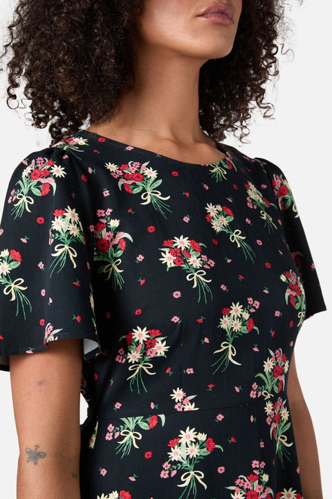 Lucia Blommig Rosettklänning