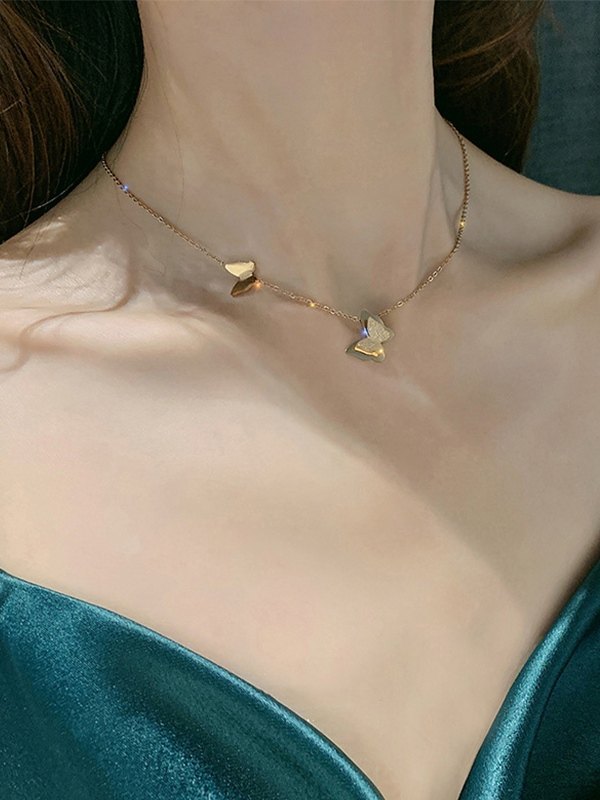 Geschichtete Schmetterlings-Charme-Halskette